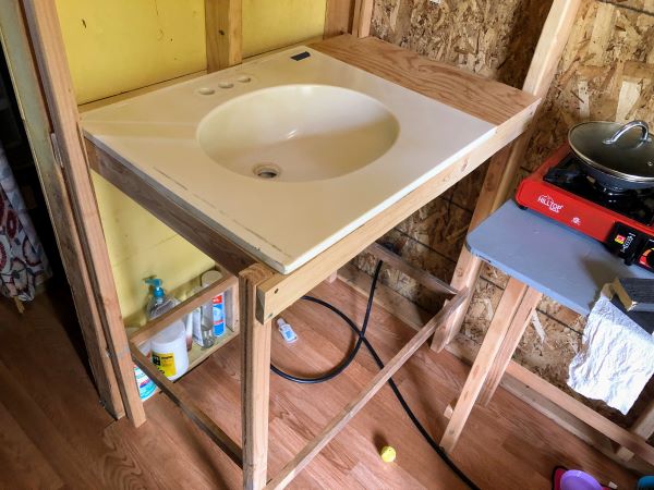 Testing the new washstand in the cabin